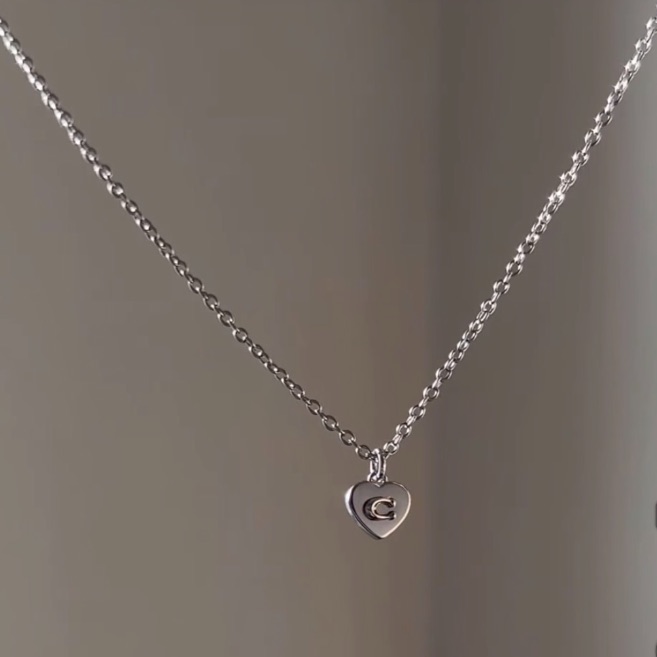 Coach Silver Necklace With Heart-Shaped Pendant 65$